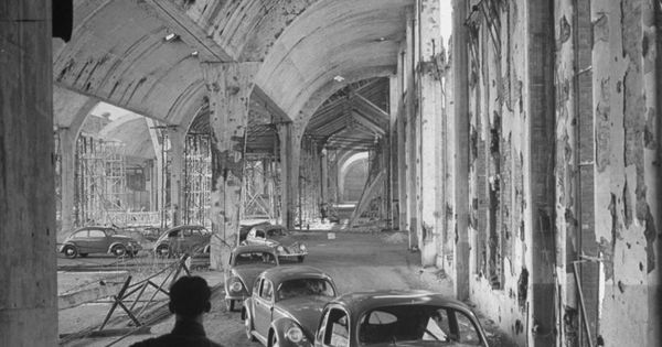 Postwar Volkswagens rolling off the assembly line in Wolfsburg, Germany (1949) | See more about Germany, Beetles and Tags.