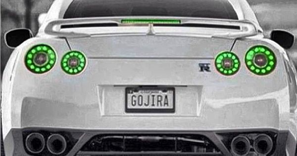 White Nissan GT-R with custom green lights -- never seen green lights on a car... Looks cool but is it legal in the USA? | See more about Nissan, Green Lights and Green.