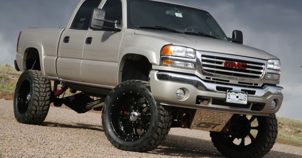 Monster-Lifted-Trucks-Wallpaper  lifted silver GMC Sierra truck | See more about Trucks, Lifted Trucks and Ford.