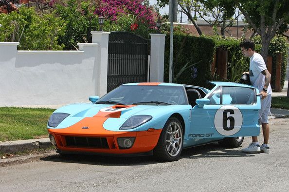 John Mayer getting in his baby blue and orange Ford GT | See more about John Mayer, Ford and Personal Trainer.