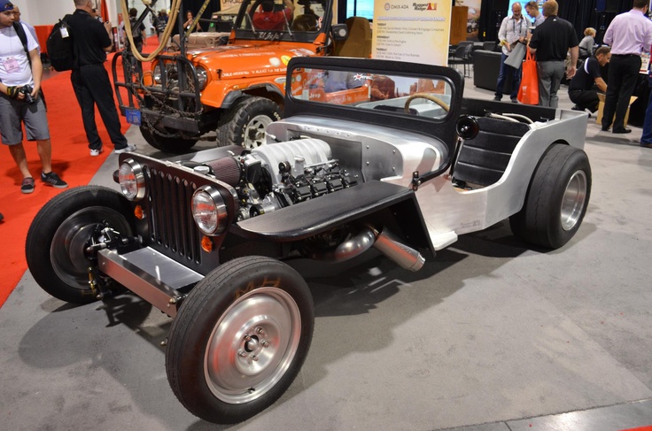1949 CJ-3A Jeep Rod powered by a 5.7L with a 426 HEMI intake. #SEMAShow | See more about Jeeps.