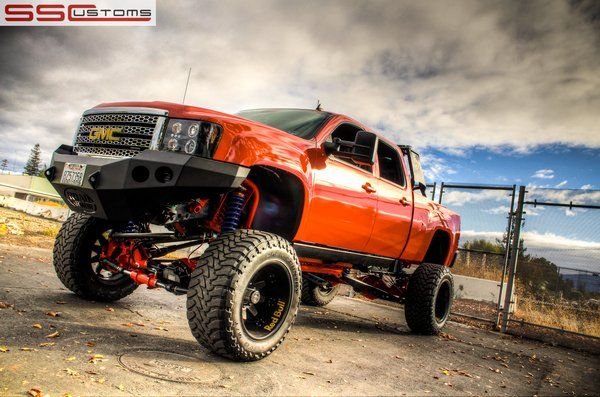 Custom one-off gloss orange wrap on a lifted GMC truck for SEMA 2012 | See more about Gmc Trucks, Trucks and Google Search.