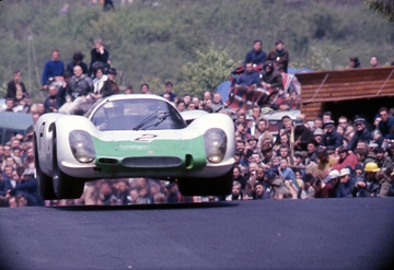 Porsche 908/2 driven by Rudi Lins and Willy Kauhsen takes off at Flugplatz during the Nurburgring 1000km in 1970. | See more about Porsche and Html.