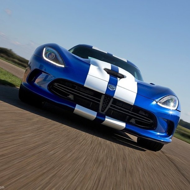 Blue Dodge Viper with white stripes because stripes make it faster! Sweet car though!! | See more about Viper, Sweet Cars and Stripes.