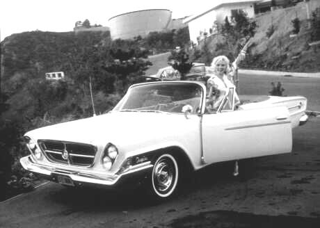 Marilyn Monroe in a 1962 Chrysler 300H convertible, owned by MGM and driven by Marilyn. | See more about Marilyn Monroe.
